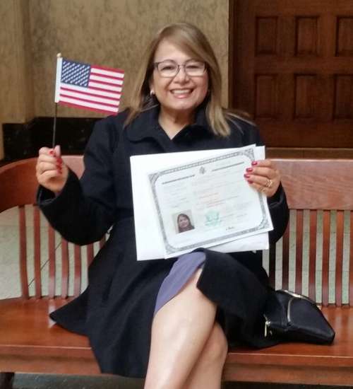 Adult learner Ceni Rodriguez celebrates her citizenship ceremony with help from Literacy Network