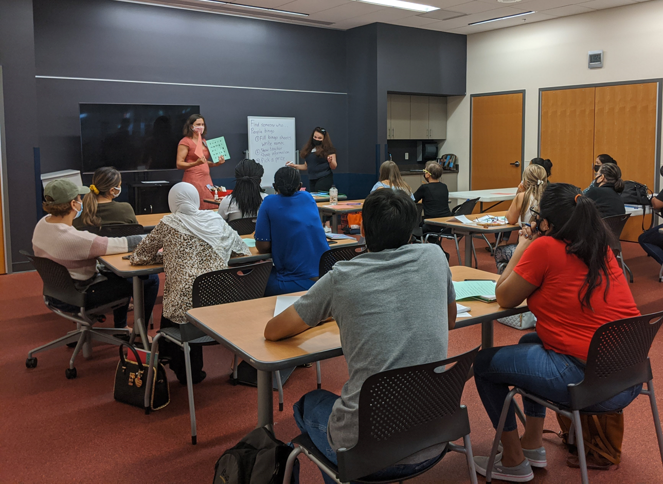 Instructors leading English class